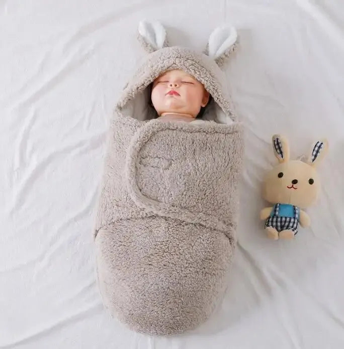 Adjustable baby swaddle sleep sack in soft cotton fabric with head protection