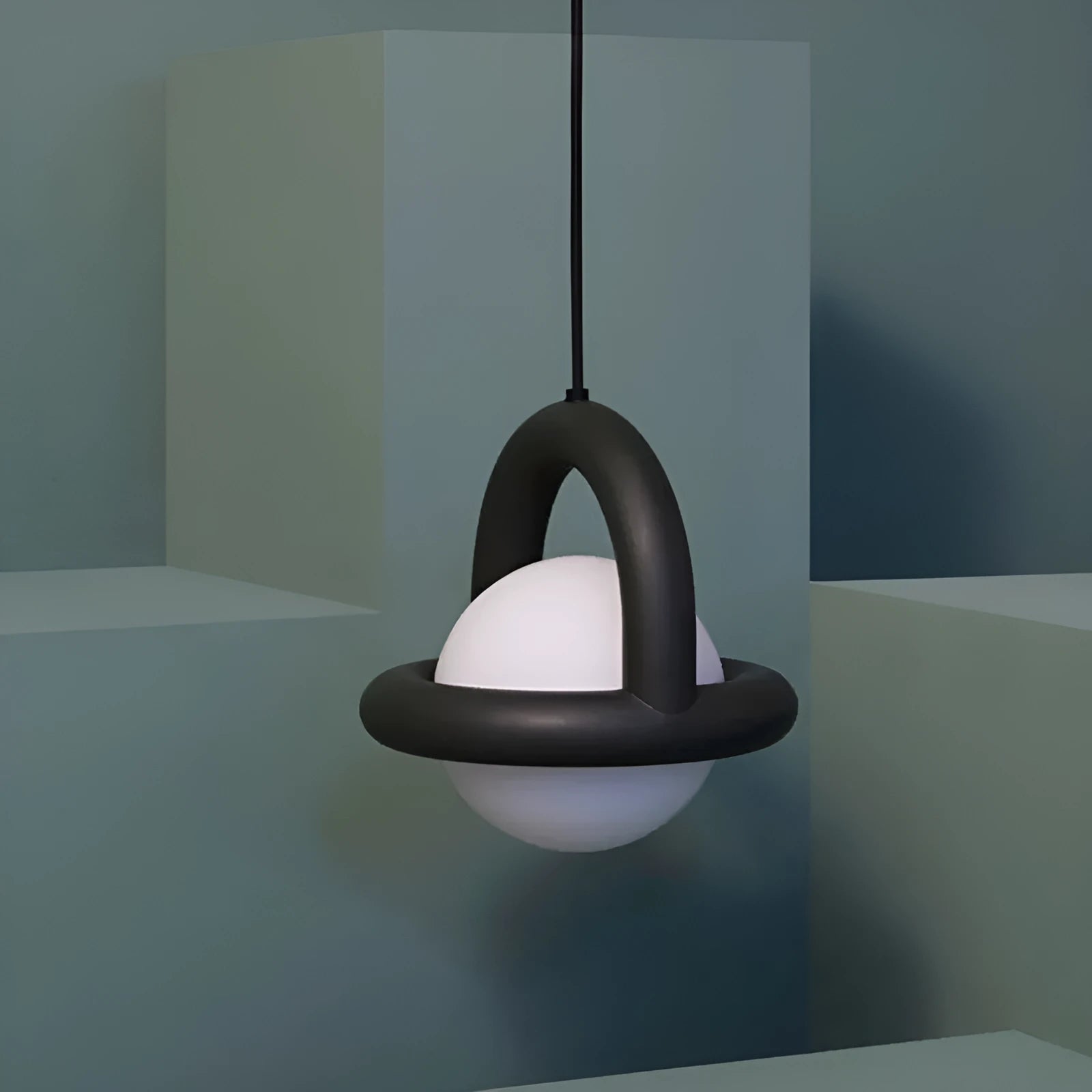 Danish designer Nordic style linear hanging pendant lamp in a choice of colours including green, mounted on a wall.