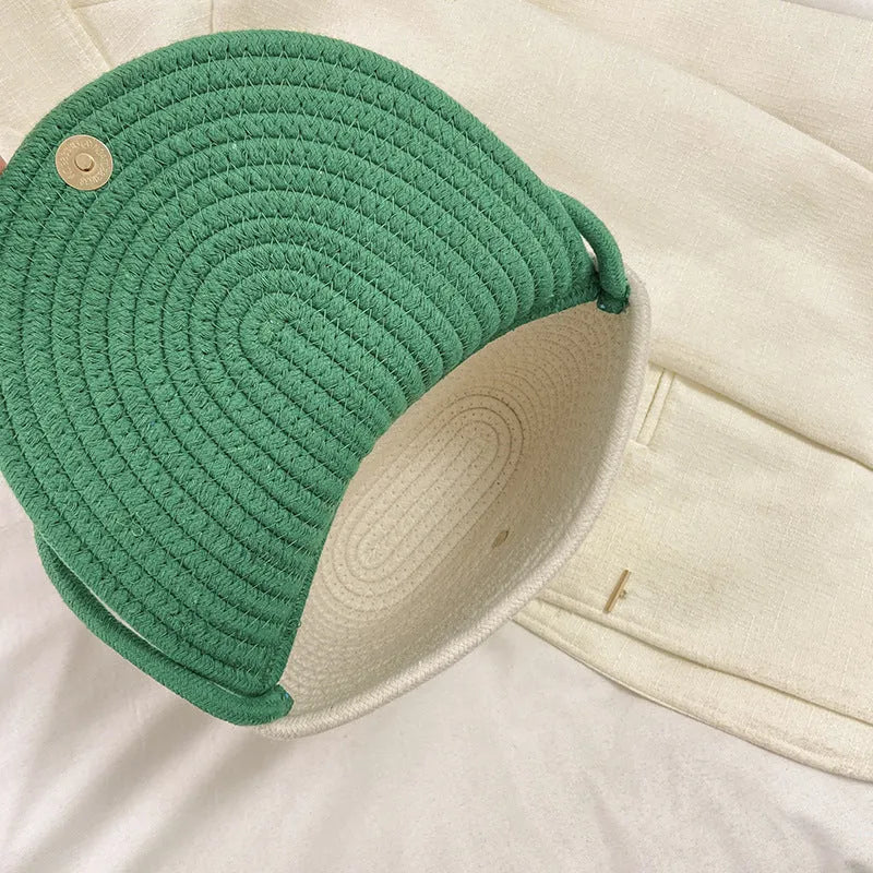 Women's cotton linen straw bucket bag with handwoven flower detail, crossbody strap, five colour options
