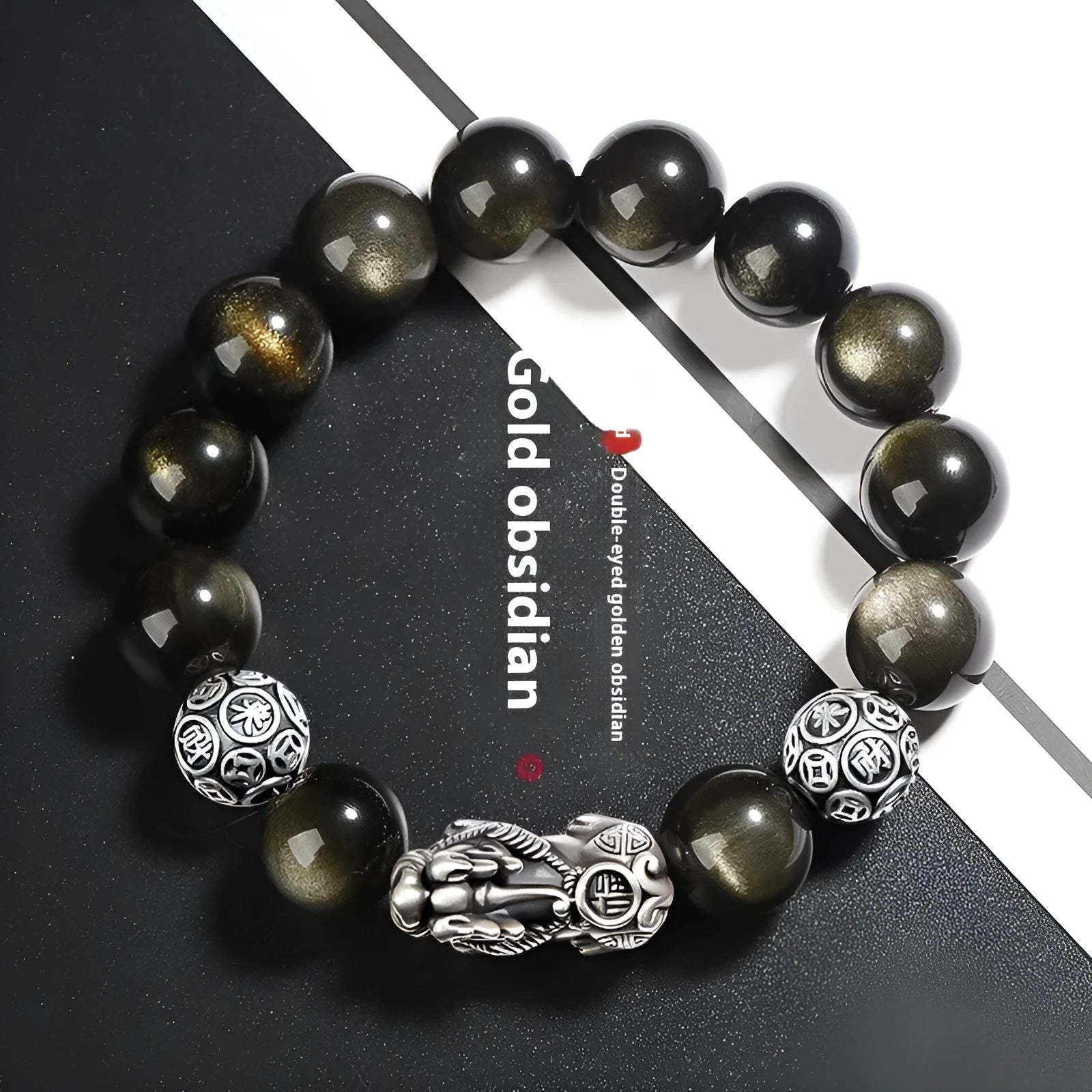 Men's geometric bracelet with a black obsidian bead and sterling silver clasp on a leather cord.