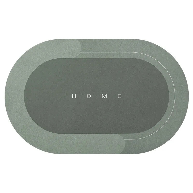Oval natural rubber bathroom floor mat in blue on tiled floor