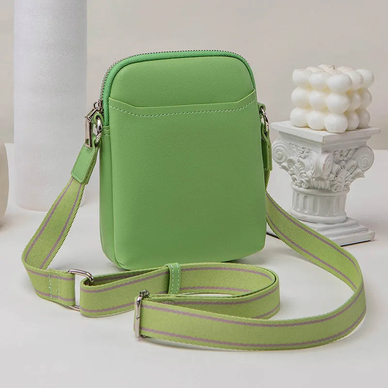 Solid colour mobile phone crossbody shoulder bag in PU material showing front view