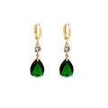 A pair of geometric green teardrop-shaped alloy drop earrings on a white background.