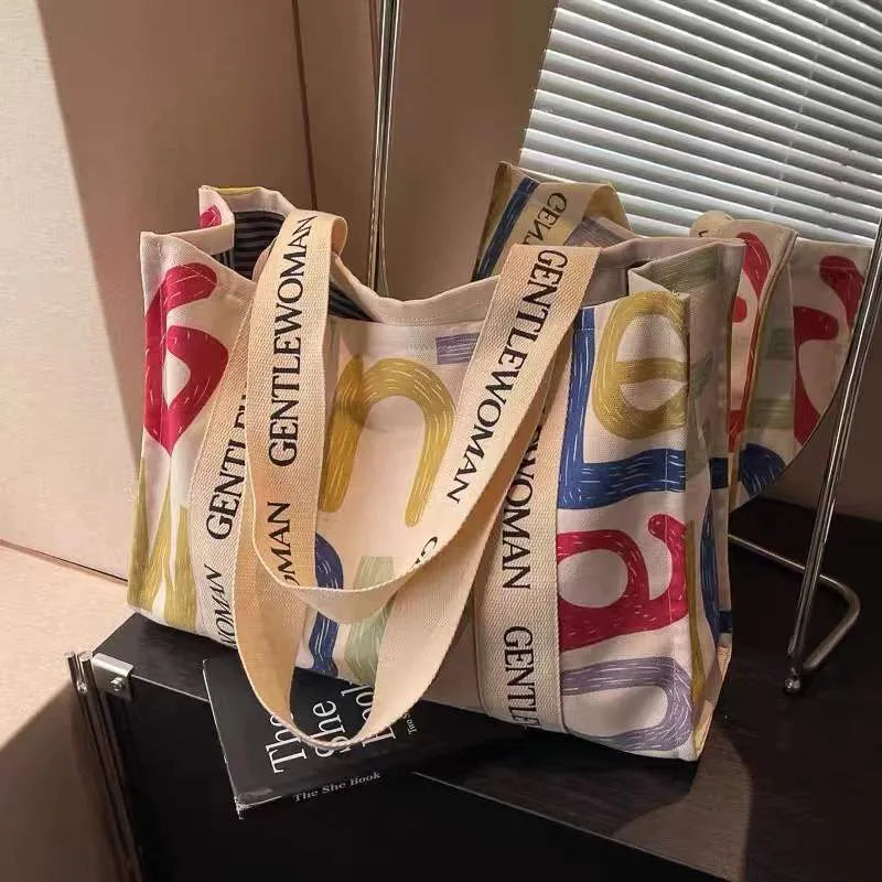 Women's canvas tote shoulder bag with large capacity and printed design options