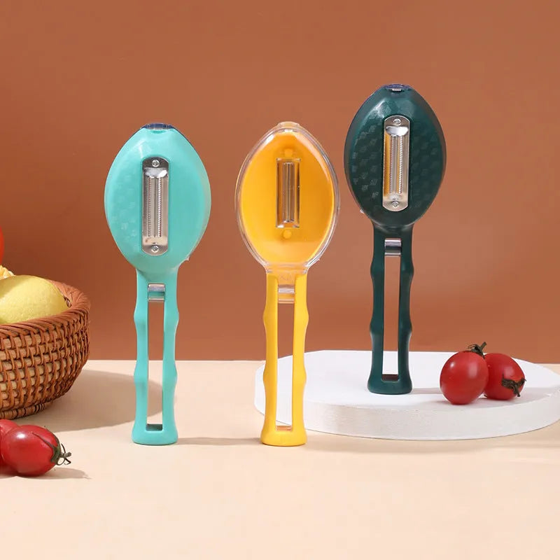 Yellow peeling knife with a storage lid next to a potato, showing its stainless steel blade and modern handle.