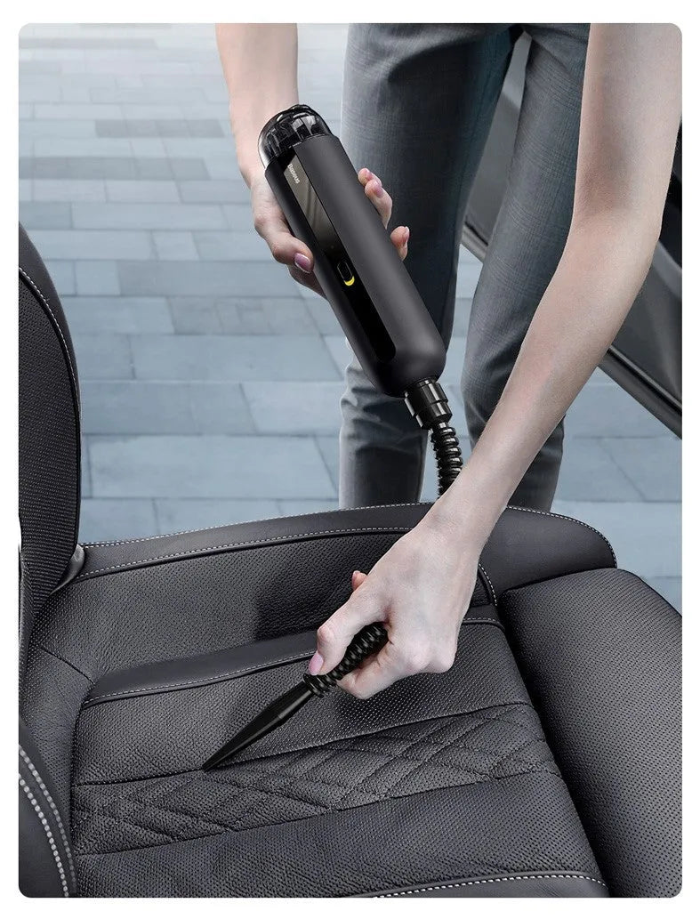 Black handheld wireless car vacuum cleaner with dust bin and blower hose
