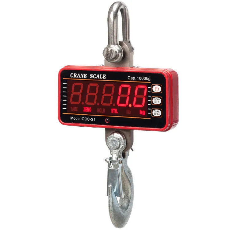 Orange electronic crane scale with digital display, shown suspended for industrial weighing.