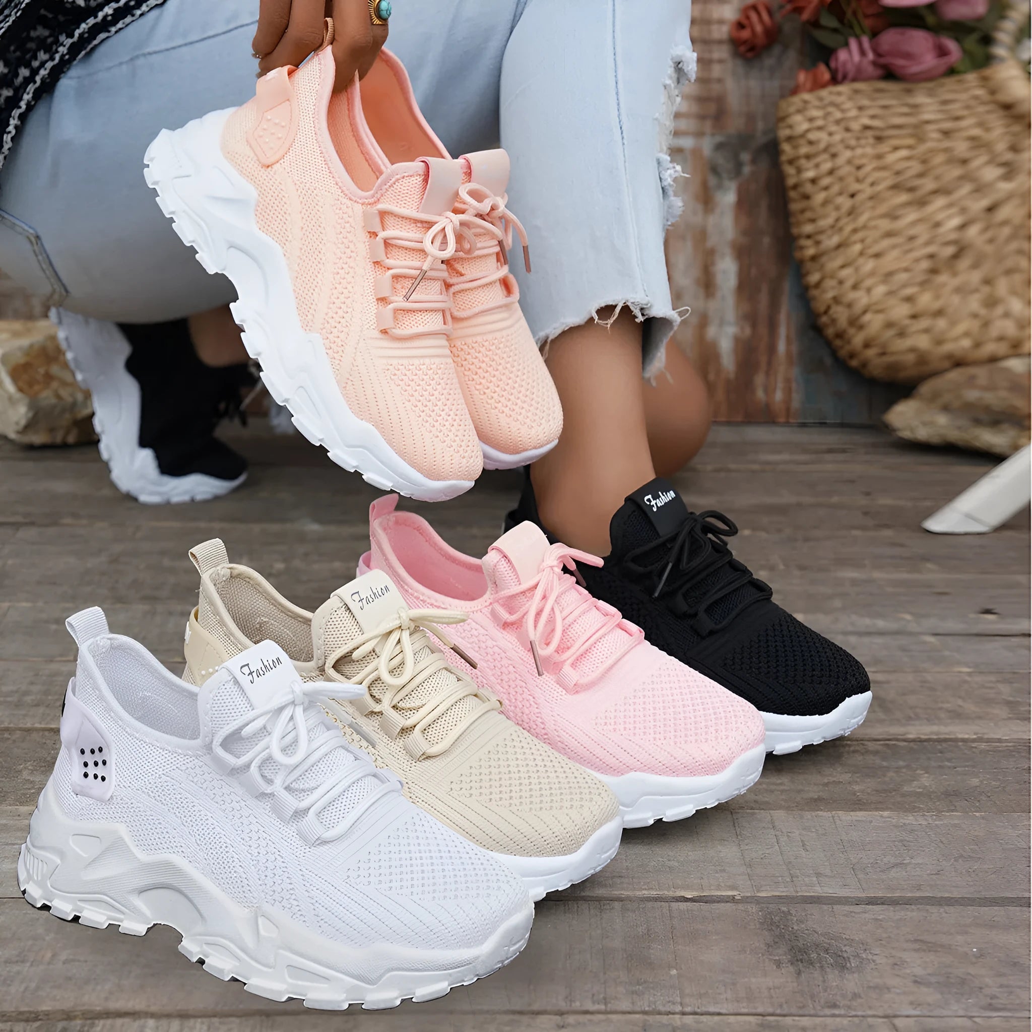 Women's Flyknit mesh casual sports shoes in a flat heel style with a lace-up front.