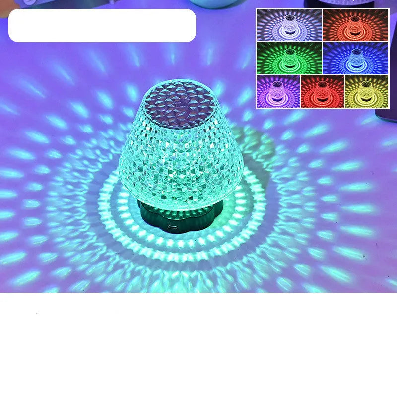 Crystal table lamp with touch base and LED lighting on wooden surface