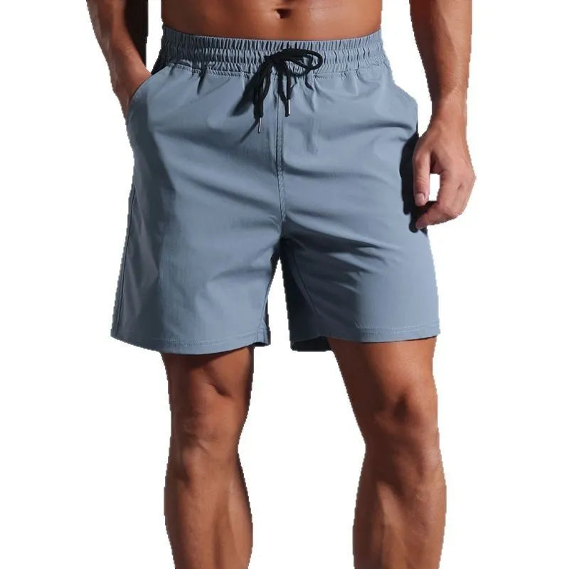 Men's loose fit quick-dry polyester shorts in straight casual style available in four colours