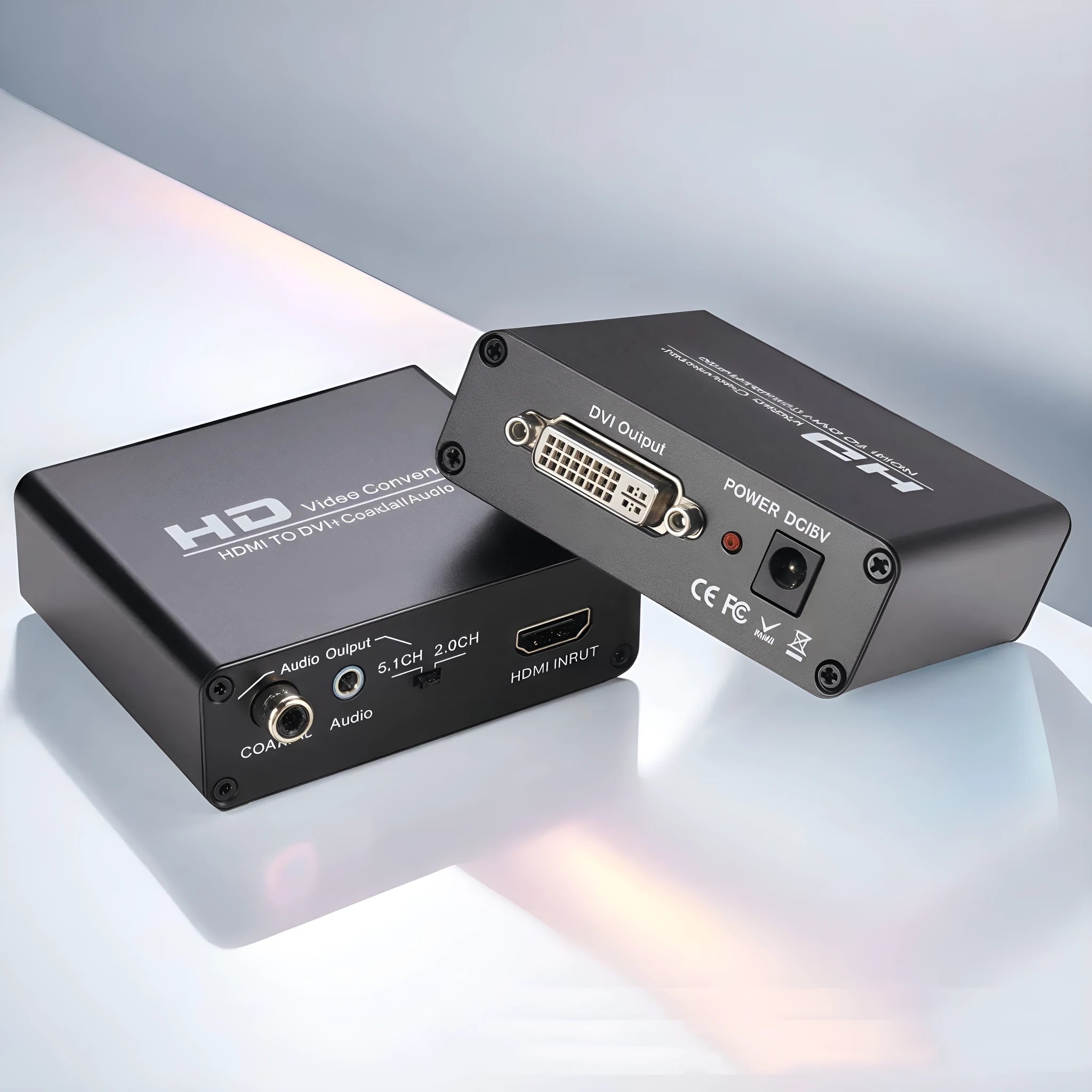 Black HDMI to DVI converter unit with attached cable and coaxial audio output port.
