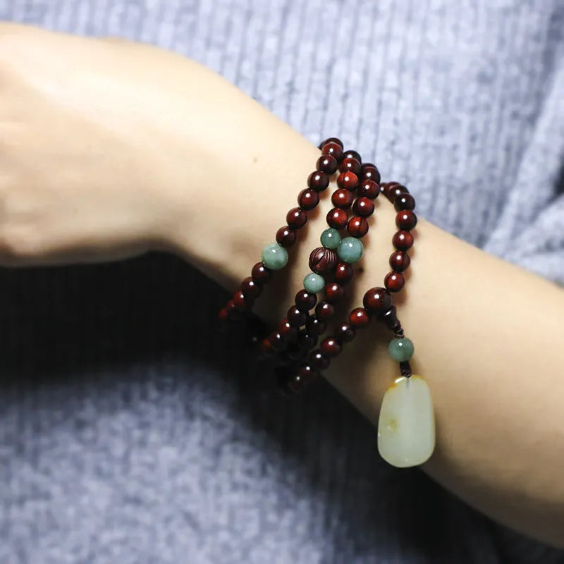 Rosewood bracelet with 108 beads and carved Hotian Jade pendant in national style design