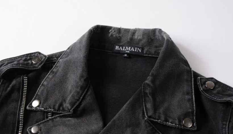 Black slim fit linen denim jacket with zipper front, zipper pockets, and lapel collar on a person