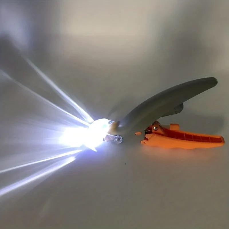 Yellow LED pet nail trimmer with magnifying glass, shown with four lights on and nail catcher.