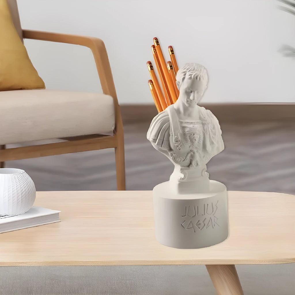 White synthetic resin pen holder designed as an American-style creative character model on a desk.