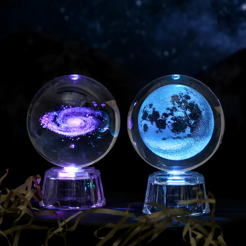 Transparent white crystal ball ornament with inner carving on wooden table with night lamp