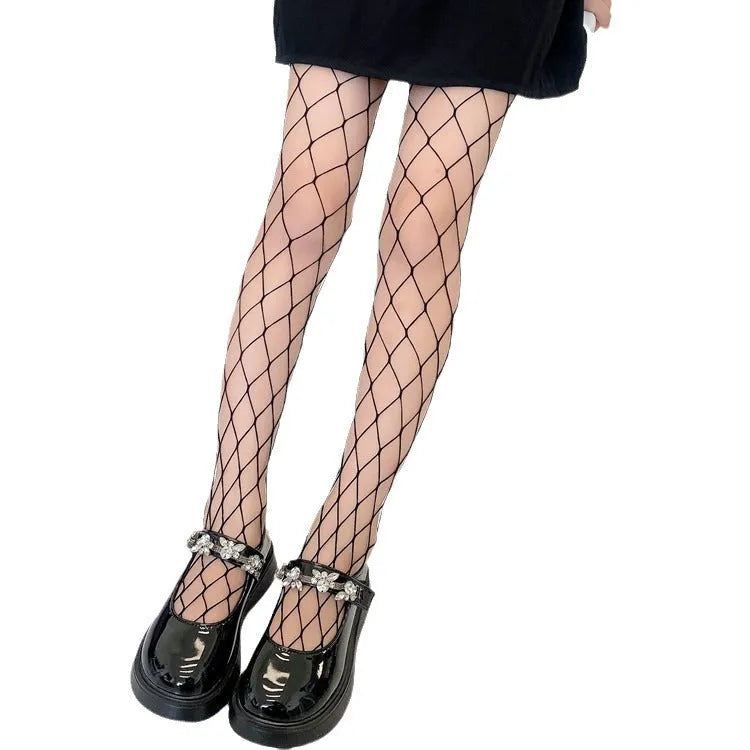 Women's summer mesh stockings showing large, medium and small pattern variations in black and white colours