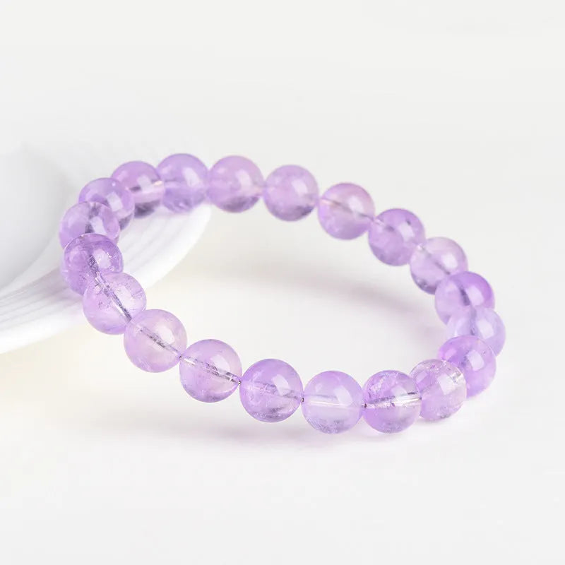 Lavender amethyst bracelet with geometric round beads showing water ripple design in cream body or transparent colour options