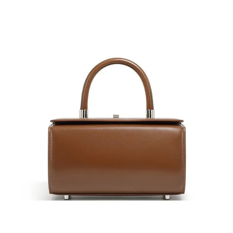 Brown genuine cowhide leather women's crossbody bag with clamshell opening shown open.