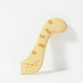 Grey silicone pet food can sealing lid and mixing spoon with integrated can opener on a white background.