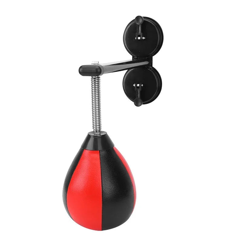 Red and black pear-shaped PU hanging speed ball with elastic band and suction cup mount for boxing training.