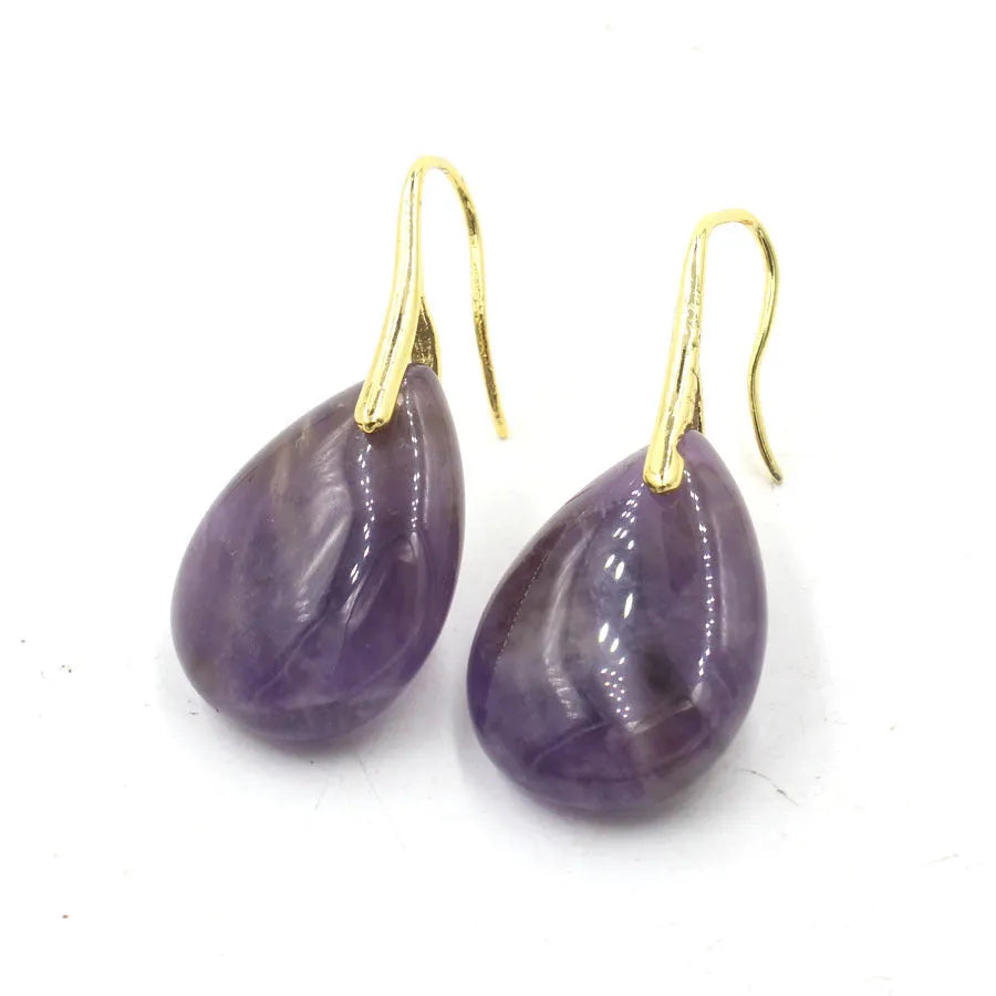 A pair of geometric water drop crystal earrings with an electroplated finish in one of nine colour options.