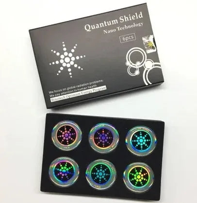Pack of six gold and silver anti-radiation mobile phone stickers on a white background.