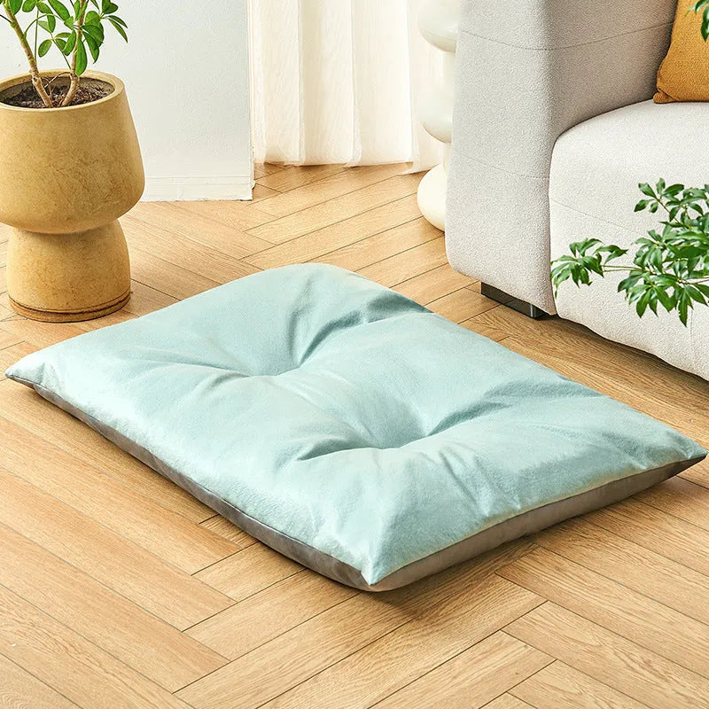 Blue and coffee coloured summer cooling pet bed for cats and dogs shown in four different sizes
