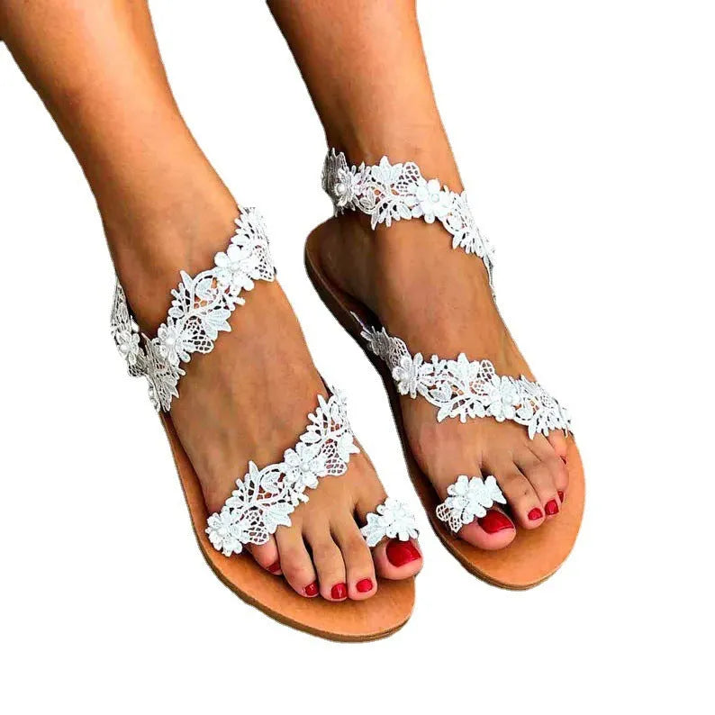White rhinestone floral plus-size womens flat sandals with round toe and slip-on design