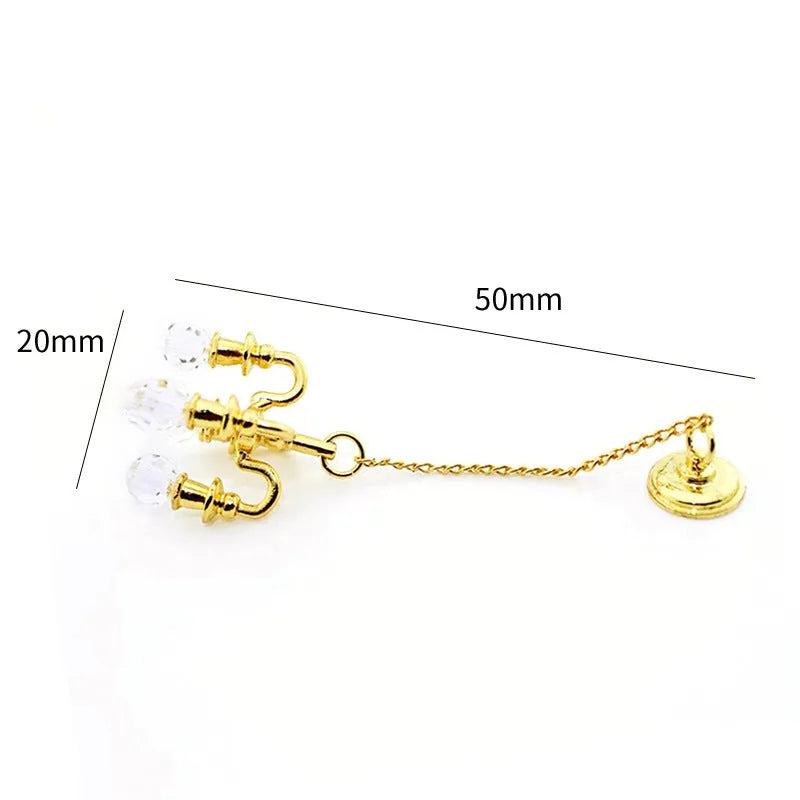 Mini retro gold and silver metal photo prop decorations measuring 5x2cm