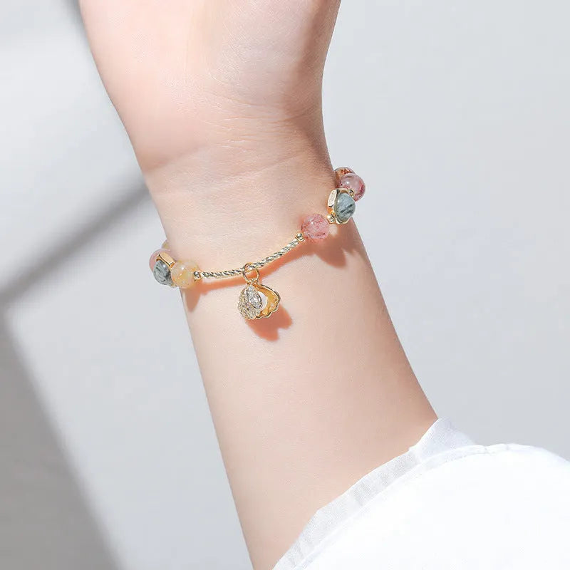 Women's crystal bracelet with shell design and animal zodiac modelling