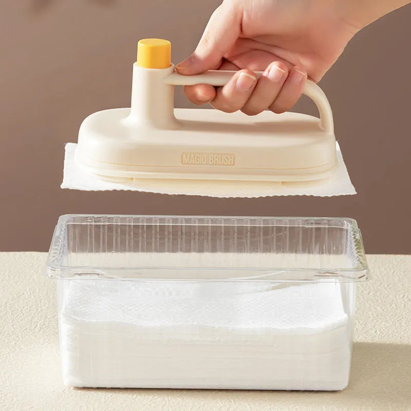 Magic Brush disposable cleaning brush with handle, 50 white rag refills, and a storage box holder.