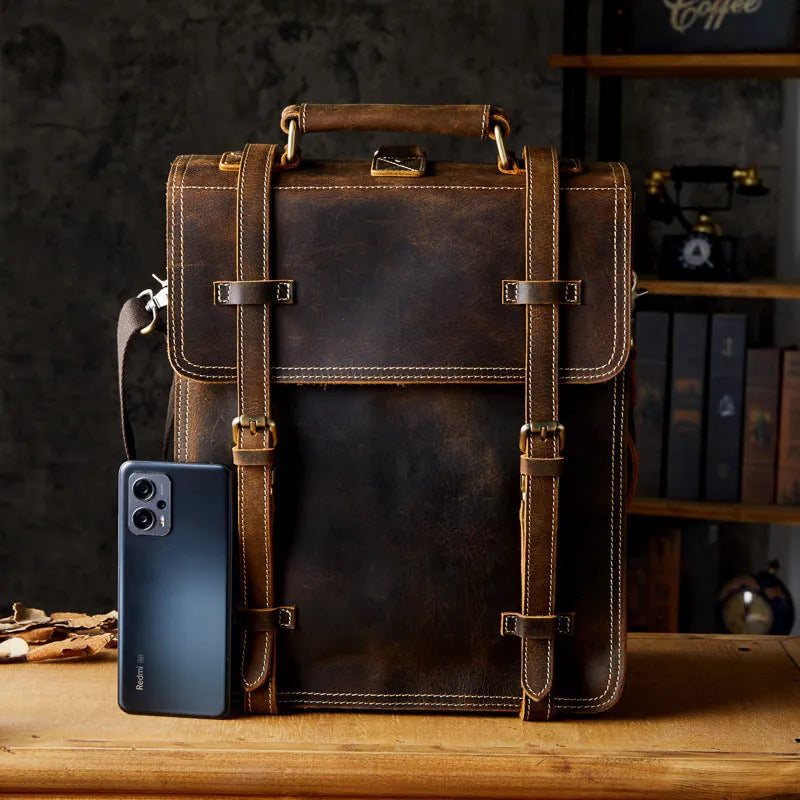 Brown first layer cowhide leather backpack with curved straps and dacron lining, 40x30x10cm