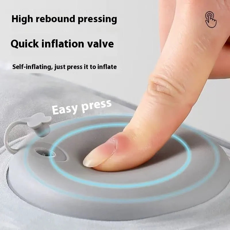 Grey inflatable seat cushion with flocked texture, shown inflated on a chair and deflated for portability.