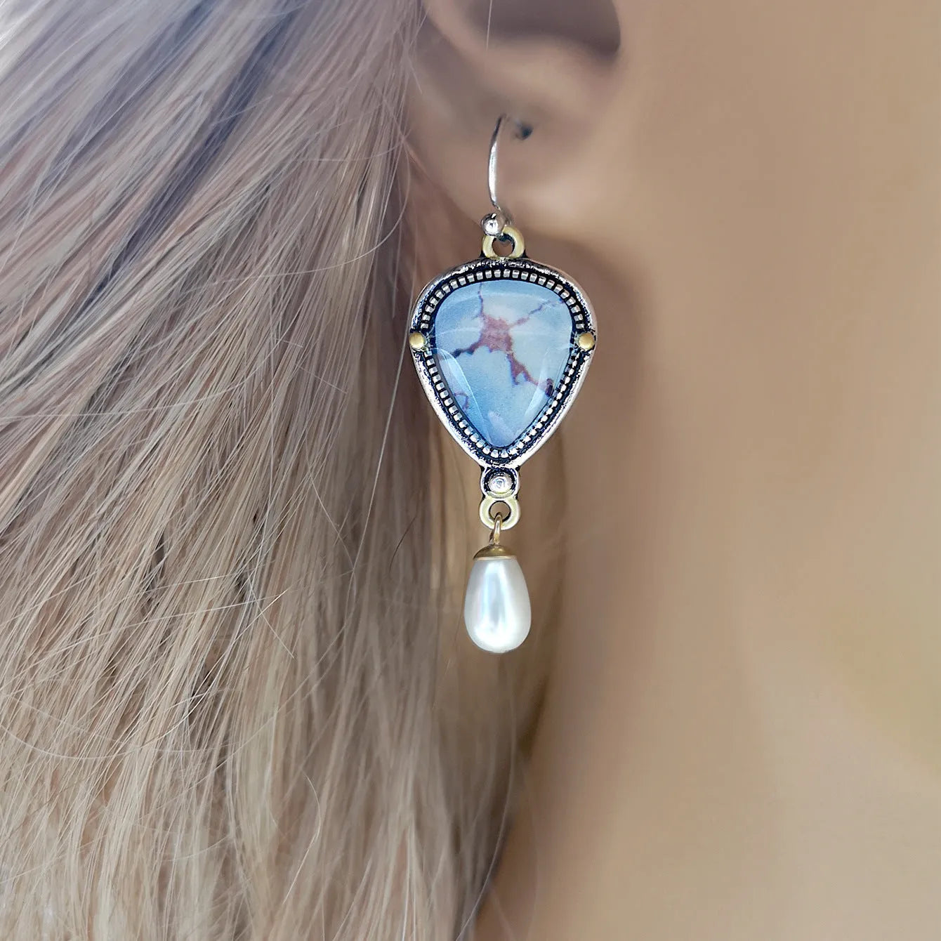 Blue retro bohemian drop earrings with synthetic opal and pearl details on electroplated metal