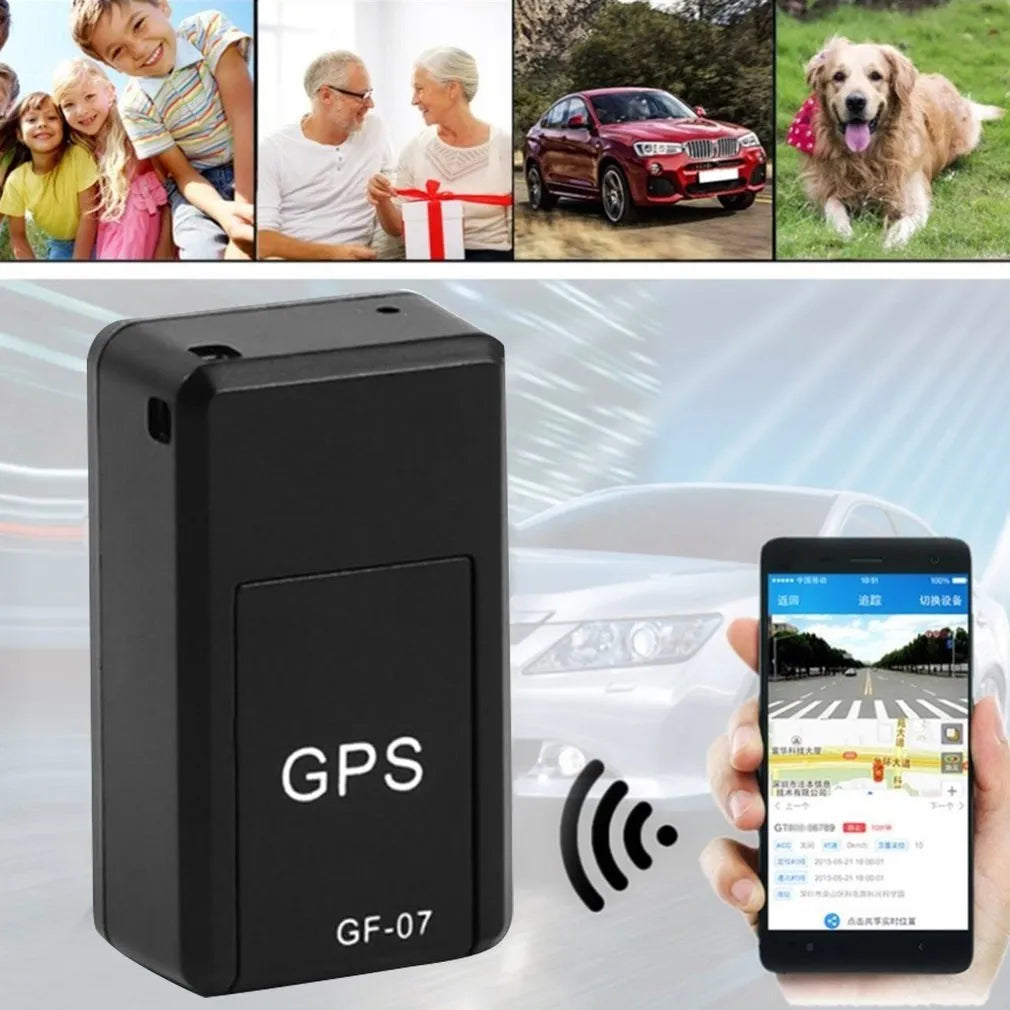 Small black plastic magnetic GPS car tracker device with USB cable.