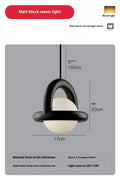 Danish designer Nordic style linear hanging pendant lamp in a choice of colours including green, mounted on a wall.