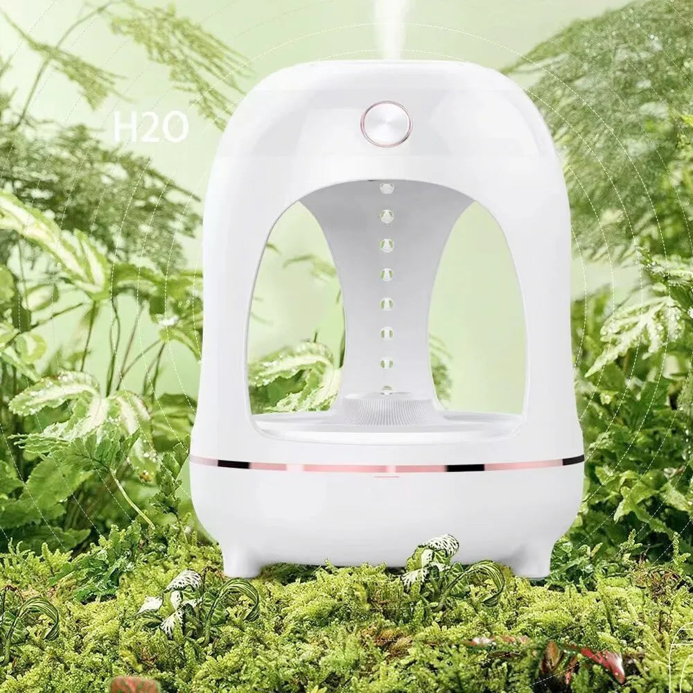 Levitation humidifier with floating water drops and LED night light in columnar design