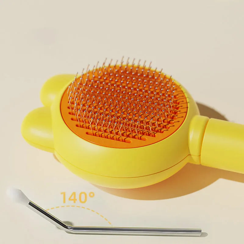 Green self-cleaning pet brush with release button and stainless steel comb for grooming cats and dogs