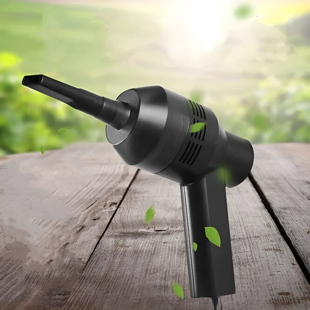 Black desktop mini vacuum cleaner with USB cable and dust collection chamber for keyboard and small space cleaning