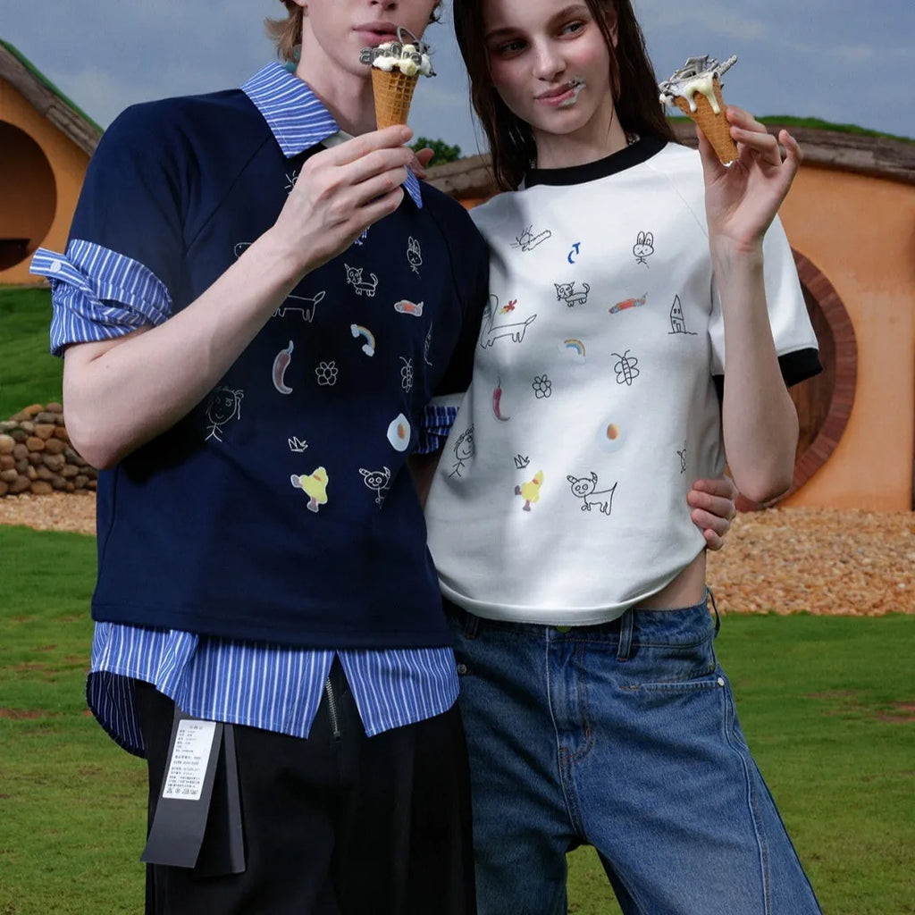 Men's cartoon printed short sleeved shirt in blue colour showing loose fit and print design details