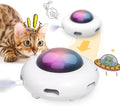 White automatic cat toy with colourful feathers and LED lights on cleaning ring mat