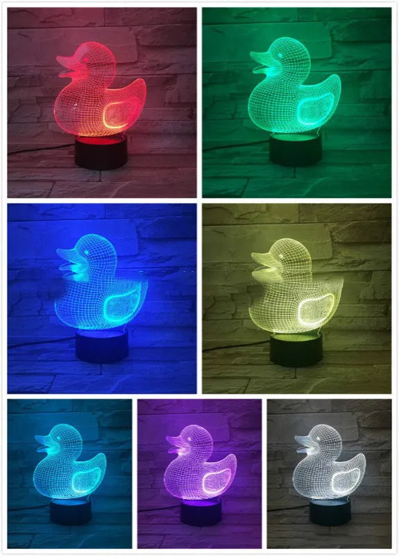 Little yellow duck 3D night light on table showing multiple colour options