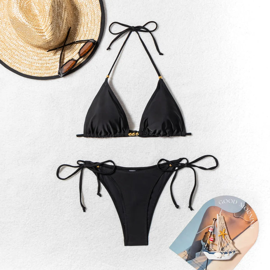 Black women's bikini swimsuit with metal bead fastening system for swimming