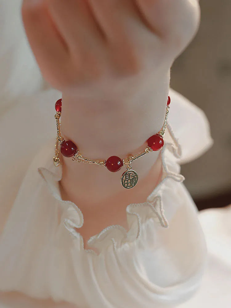 Women's red agate and alloy Hongma lucky card double-layer bracelet in gift box.