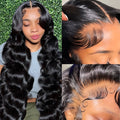 Black medium-long curly synthetic wig with lace mesh base showing defined wave pattern