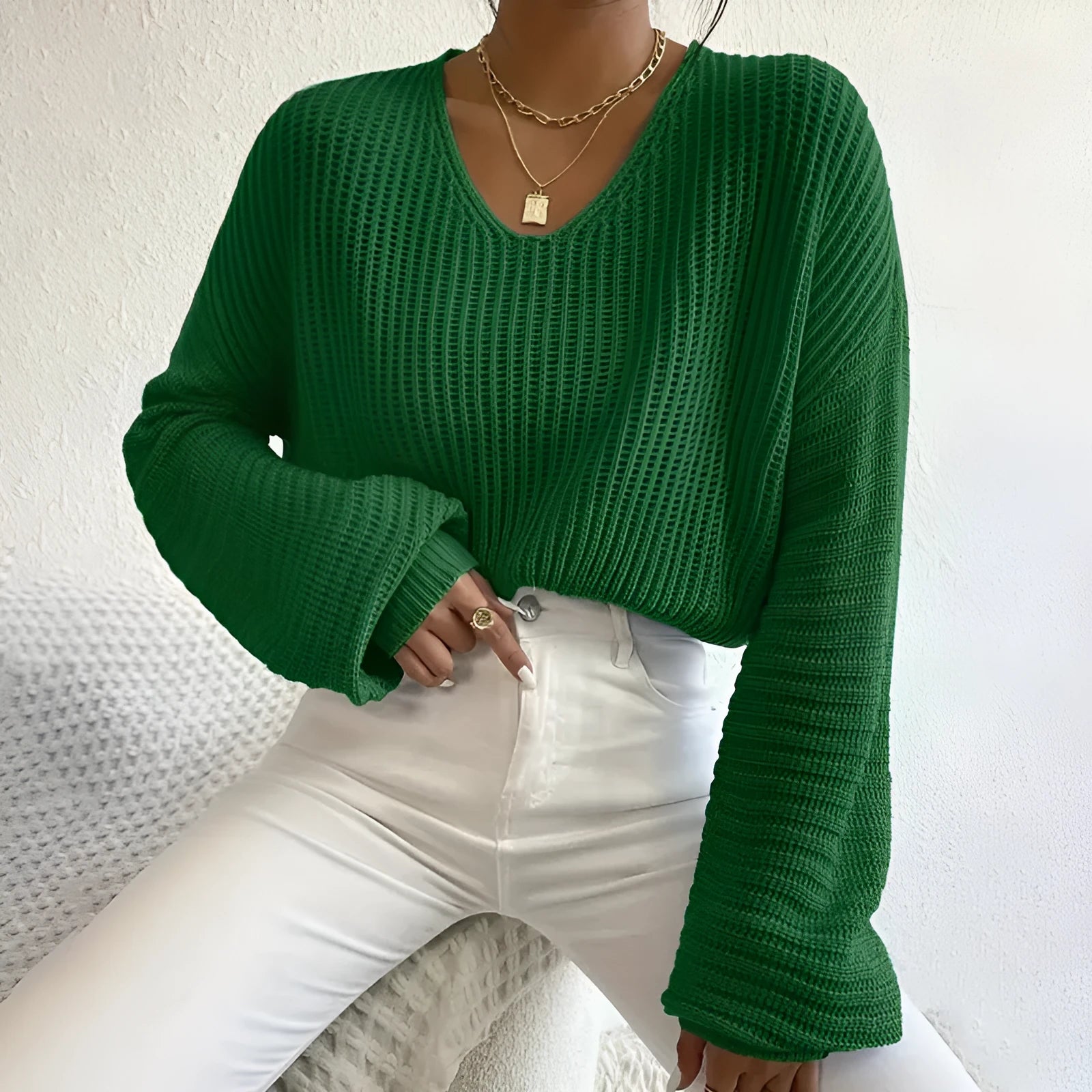 Solid colour long sleeve women's pullover in a loose casual fit.