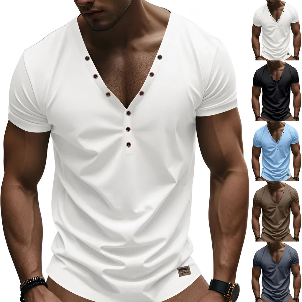 Man wearing a loose fit light blue V-neck pullover top with a button detail.