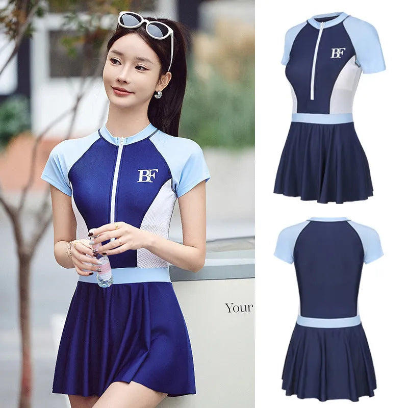 Ladies conservative one-piece swimsuit for sports in a colour-matched pattern.