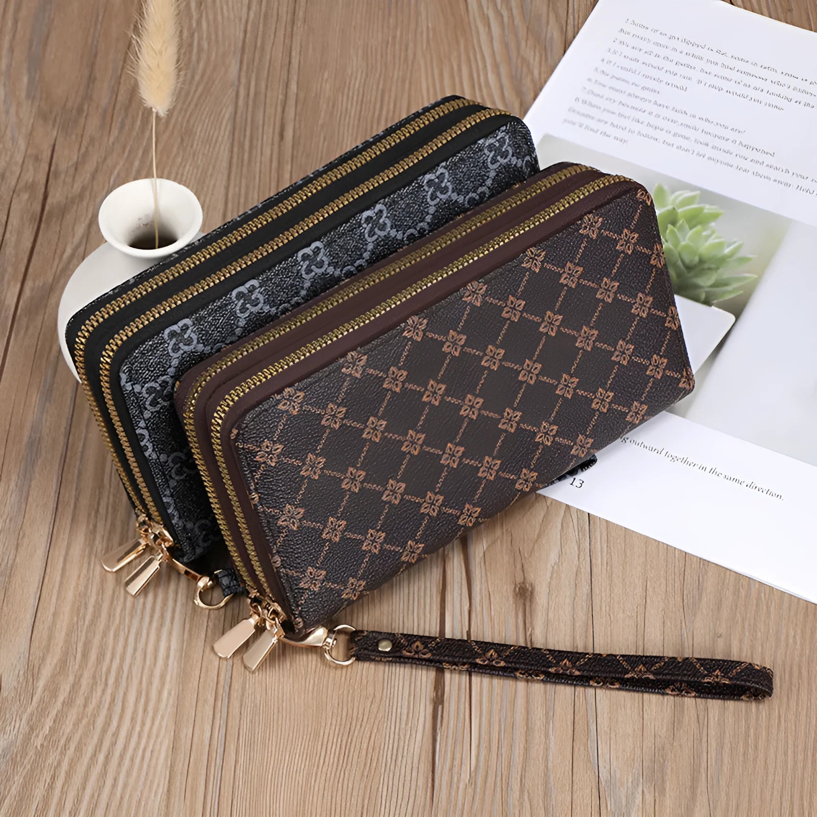 Long black PU leather wallet clutch with phone slot, card holders, and zippered coin purse